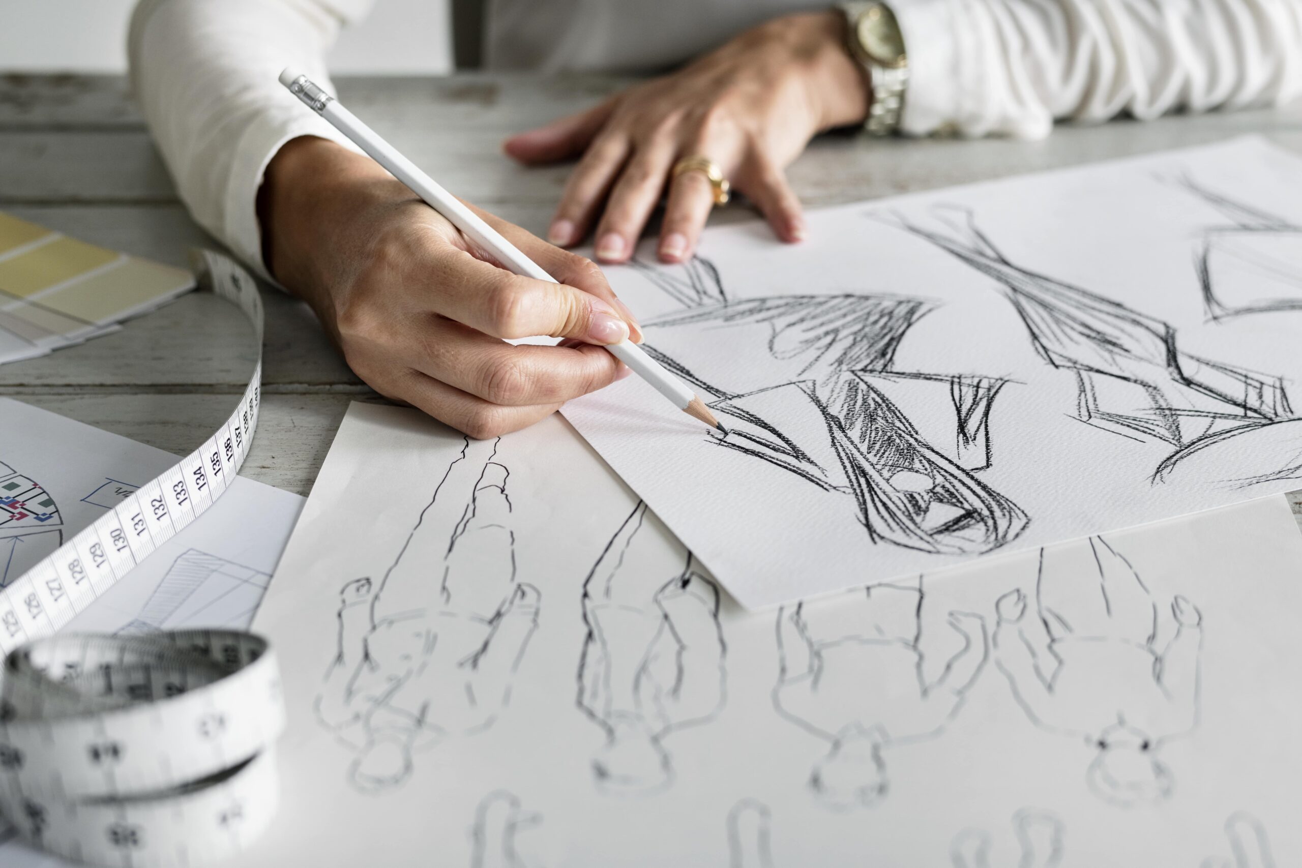 caucasian designer creating new design min